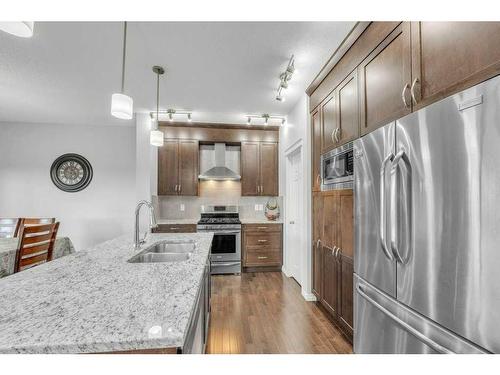 212 Walden Parade Se, Calgary, AB - Indoor Photo Showing Kitchen With Stainless Steel Kitchen With Double Sink With Upgraded Kitchen