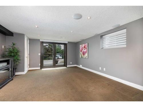 11 Woodlark Drive Sw, Calgary, AB - Indoor Photo Showing Other Room