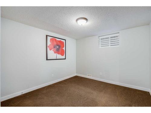 11 Woodlark Drive Sw, Calgary, AB - Indoor Photo Showing Other Room