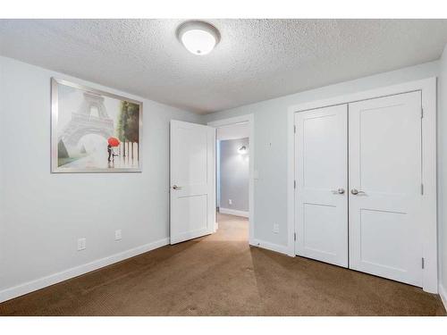 11 Woodlark Drive Sw, Calgary, AB - Indoor Photo Showing Other Room