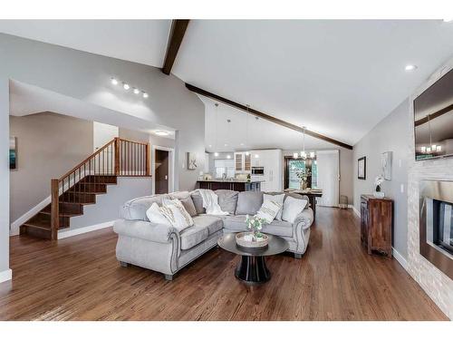 11 Woodlark Drive Sw, Calgary, AB - Indoor Photo Showing Living Room With Fireplace