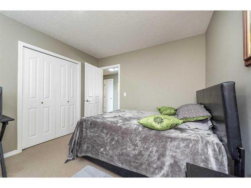 113 Royal Birch View Nw, Calgary, AB - Indoor Photo Showing Bedroom