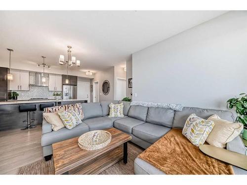 507-2231 Mahogany Boulevard Se, Calgary, AB - Indoor Photo Showing Living Room