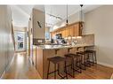 110-1909 36 Avenue Sw, Calgary, AB  - Indoor Photo Showing Kitchen With Upgraded Kitchen 