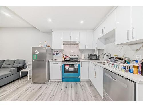 1328 Cornerstone Way Ne, Calgary, AB - Indoor Photo Showing Kitchen With Double Sink