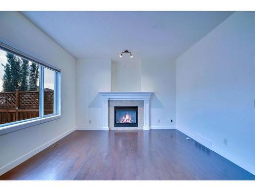 506 Williamstown Green Nw, Airdrie, AB - Indoor Photo Showing Living Room With Fireplace