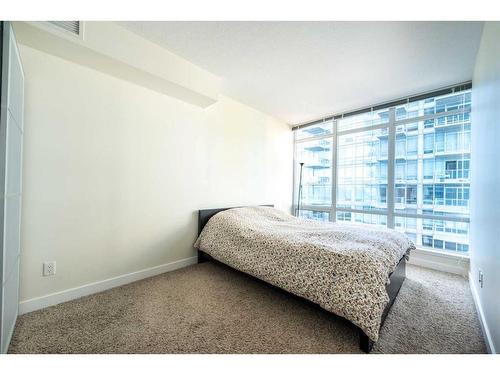 402-3830 Brentwood Road Nw, Calgary, AB - Indoor Photo Showing Bedroom