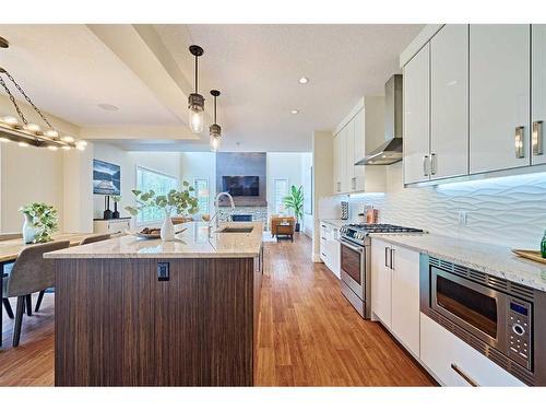 32 West Grove Bay Sw, Calgary, AB - Indoor Photo Showing Kitchen With Upgraded Kitchen