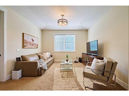 32 West Grove Bay Sw, Calgary, AB - Indoor Photo Showing Living Room