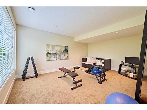 32 West Grove Bay Sw, Calgary, AB - Indoor Photo Showing Gym Room