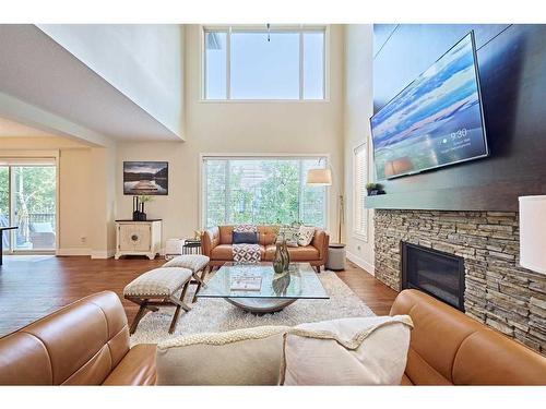 32 West Grove Bay Sw, Calgary, AB - Indoor Photo Showing Living Room With Fireplace