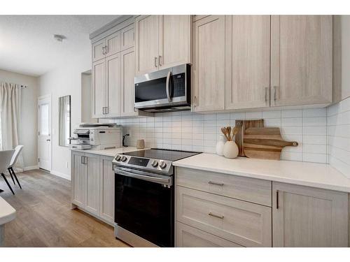 2773 Baywater Landing Sw, Airdrie, AB - Indoor Photo Showing Kitchen