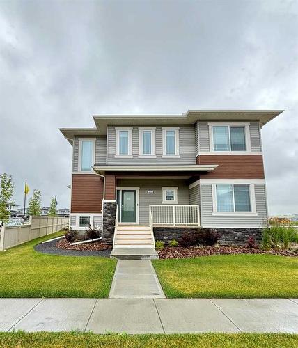 2773 Baywater Landing Sw, Airdrie, AB - Outdoor With Deck Patio Veranda With Facade