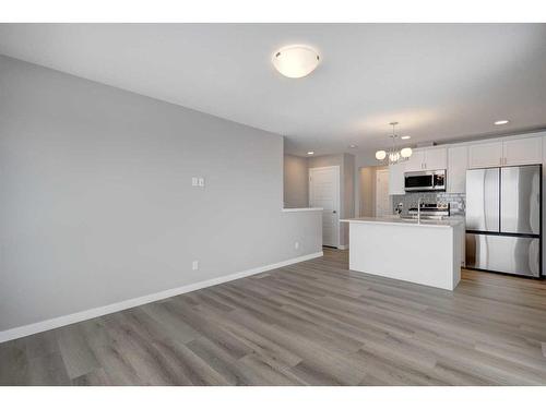 2773 Baywater Landing Sw, Airdrie, AB - Indoor Photo Showing Kitchen