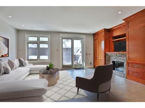 2123 Broadview Road Nw, Calgary, AB - Indoor Photo Showing Living Room With Fireplace