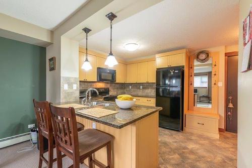 106-920 68 Avenue Sw, Calgary, AB - Indoor Photo Showing Kitchen