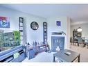 9203-315 Southampton Drive Sw, Calgary, AB  - Indoor Photo Showing Living Room With Fireplace 