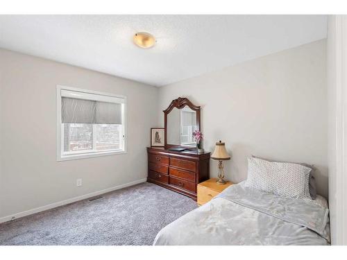 33 Legacy Woods Place Se, Calgary, AB - Indoor Photo Showing Bedroom