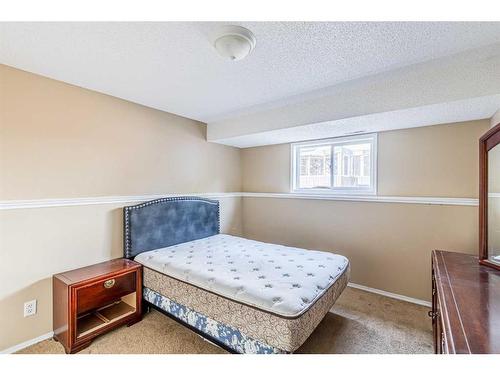 132 Mt Apex Green Se, Calgary, AB - Indoor Photo Showing Bedroom