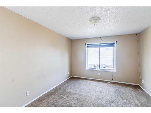 132 Mt Apex Green Se, Calgary, AB - Indoor Photo Showing Other Room