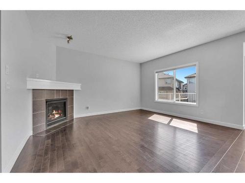 35 Skyview Shores Court Ne, Calgary, AB - Indoor Photo Showing Living Room With Fireplace