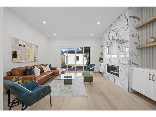 2025 26 Street Sw, Calgary, AB - Indoor Photo Showing Living Room With Fireplace