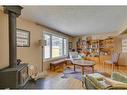 6140 Dalmarnock Crescent Nw, Calgary, AB  - Indoor Photo Showing Living Room 