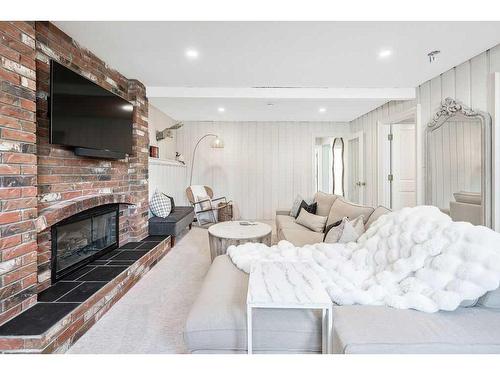 13107 Lake Arrow Road Se, Calgary, AB - Indoor Photo Showing Living Room With Fireplace