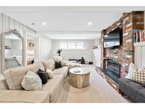 13107 Lake Arrow Road Se, Calgary, AB - Indoor Photo Showing Living Room With Fireplace