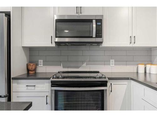 623 Cranbrook Walk Se, Calgary, AB - Indoor Photo Showing Kitchen With Stainless Steel Kitchen With Upgraded Kitchen