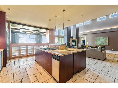 30 Patina Lane Sw, Calgary, AB - Indoor Photo Showing Kitchen With Fireplace