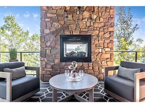 30 Patina Lane Sw, Calgary, AB -  Photo Showing Living Room With Fireplace