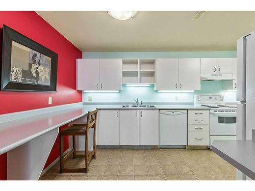 30 Patina Lane Sw, Calgary, AB - Indoor Photo Showing Kitchen With Double Sink