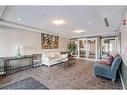 416-3111 34 Avenue Nw, Calgary, AB  - Indoor Photo Showing Living Room 