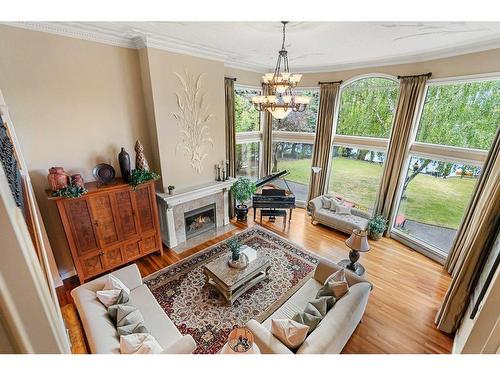 819 Lake Placid Drive Se, Calgary, AB - Indoor Photo Showing Living Room With Fireplace