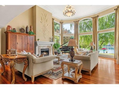 819 Lake Placid Drive Se, Calgary, AB - Indoor Photo Showing Living Room With Fireplace