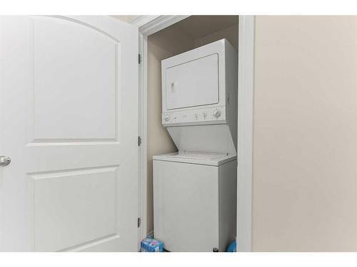 268 Panatella Drive Nw, Calgary, AB - Indoor Photo Showing Laundry Room