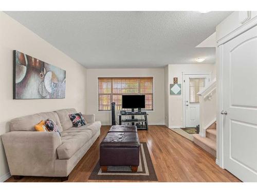 268 Panatella Drive Nw, Calgary, AB - Indoor Photo Showing Living Room