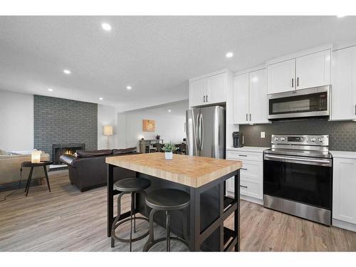 108 Cantrell Drive Sw, Calgary, AB - Indoor Photo Showing Kitchen With Stainless Steel Kitchen