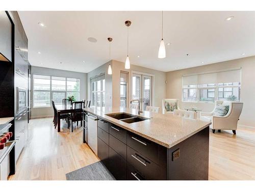 721 Aspen Meadows Hill Sw, Calgary, AB - Indoor Photo Showing Kitchen With Double Sink With Upgraded Kitchen