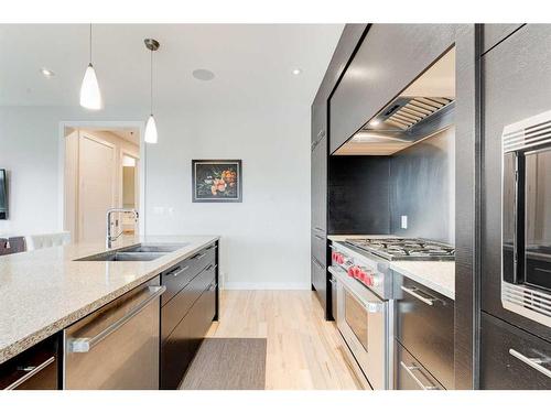 721 Aspen Meadows Hill Sw, Calgary, AB - Indoor Photo Showing Kitchen With Double Sink With Upgraded Kitchen