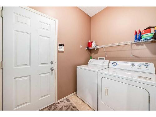 219 New Brighton Circle Se, Calgary, AB - Indoor Photo Showing Laundry Room