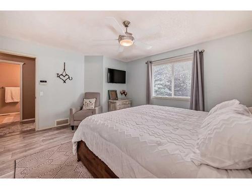 219 New Brighton Circle Se, Calgary, AB - Indoor Photo Showing Bedroom