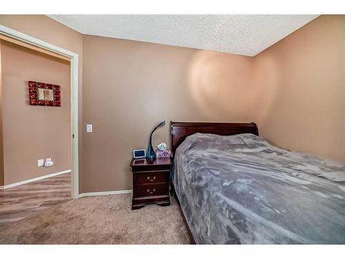 219 New Brighton Circle Se, Calgary, AB - Indoor Photo Showing Bedroom