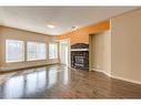 335-10 Discovery Ridge Close Sw, Calgary, AB  - Indoor Photo Showing Living Room With Fireplace 