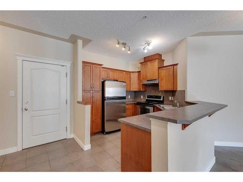 335-10 Discovery Ridge Close Sw, Calgary, AB - Indoor Photo Showing Kitchen With Stainless Steel Kitchen