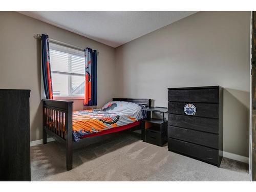 650 West Highland Crescent, Carstairs, AB - Indoor Photo Showing Bedroom