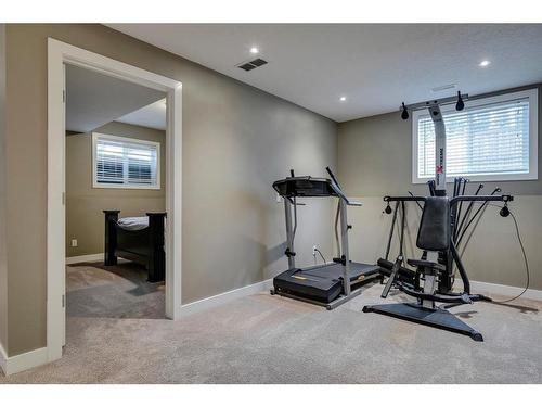 650 West Highland Crescent, Carstairs, AB - Indoor Photo Showing Gym Room