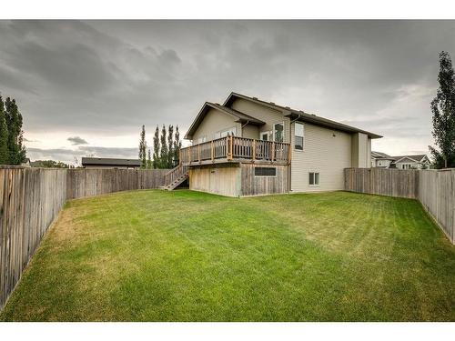 650 West Highland Crescent, Carstairs, AB - Outdoor With Deck Patio Veranda With Backyard