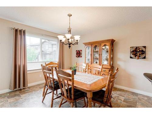 117 Springmere Grove, Chestermere, AB - Indoor Photo Showing Dining Room